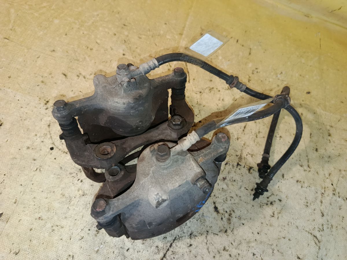 Суппорт на Nissan Wingroad WFY11 QG15DE Фото 1