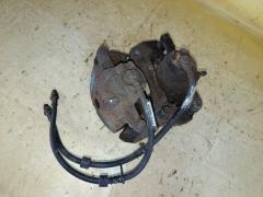 Суппорт на Mitsubishi Grandis NA4W 4G69, Переднее расположение