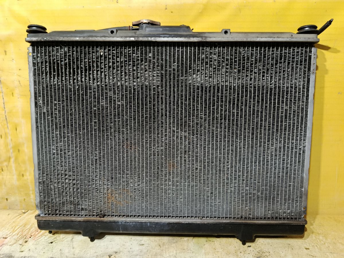 Радиатор ДВС 01163028, 10-26844-SX, 104855, 119084, 140055N, 2064029, 248158F, 248158J, 248158R, 248158U, 248180U, 28200, 314347, 32002200, 37855, 522200R, 526908-2, 5269082K, 53686, 60322200, 68158, 734197, 8010-306, 8MK 376 753-671, ADC49847, ARD1443, C557-39, CR 1073 000S, DA36935, DAP369035, DCM2526, JPR0110, LRC 11172, MBPIN99-910, MBPIN99-911, MBPIN99910, MC-H77W-1216, MC00012, MC00012-2R, MMC012, MR373172, MR373172-N2, MR373172-R1, MR431239, MR464810, MR571562, MT2200, PL031281, PL031281R, PL031282, PRD1443, STMC00012, TD-036-0021, VCS4197, WG1722514 на Mitsubishi Pajero Io H76W 4G93 Фото 1