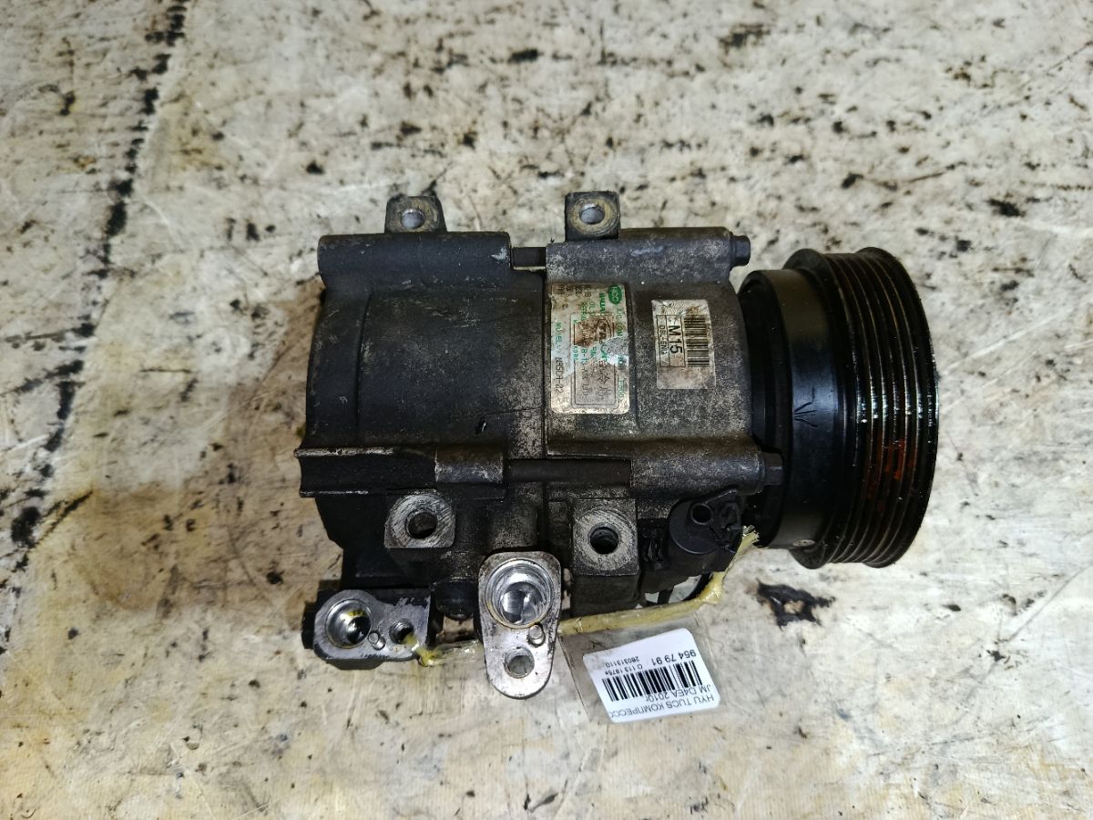 Компрессор кондиционера на Hyundai Tucson 1 JM D4EA Фото 1