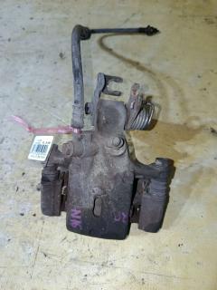 Суппорт на Nissan Almera N16 QG16DE, Заднее Правое расположение