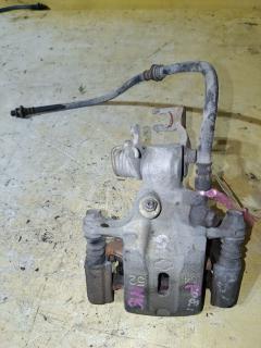 Суппорт на Nissan Almera N16 QG16DE, Заднее Левое расположение