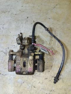 Суппорт на Nissan Almera N16 QG16DE, Заднее Левое расположение