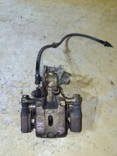 Суппорт на Nissan Almera N16 QG16DE, Заднее Правое расположение