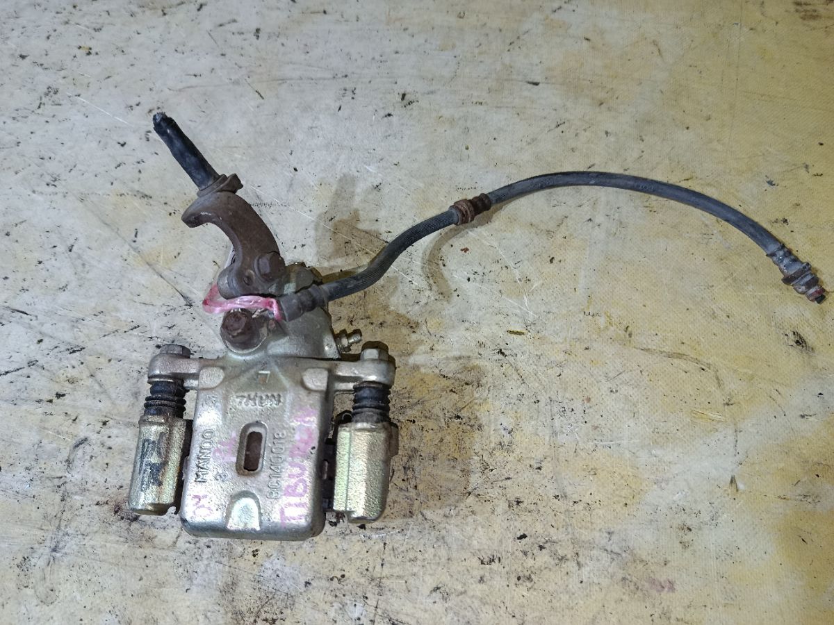 Суппорт на Hyundai Tiburon Фото 1