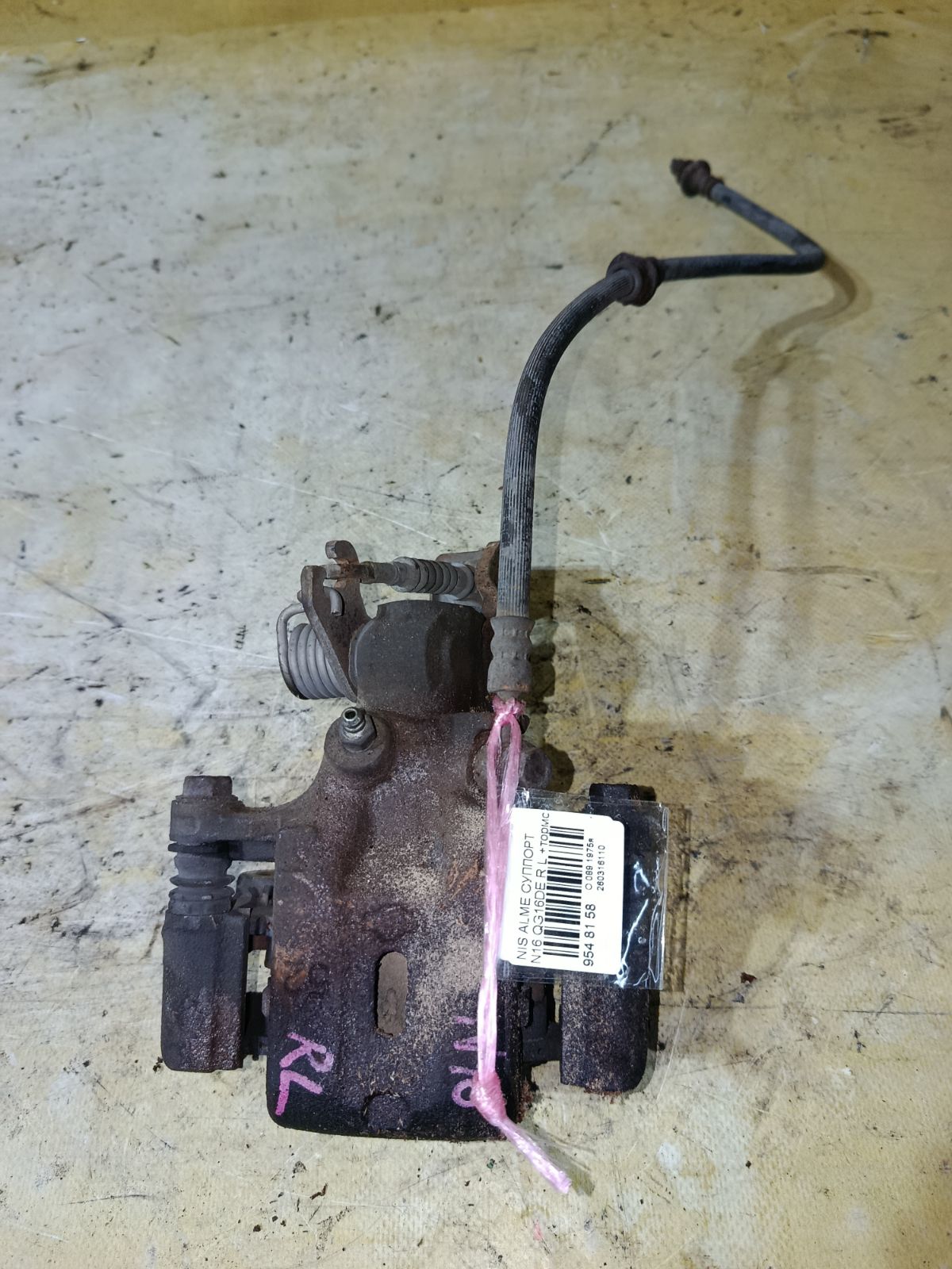 Суппорт на Nissan Almera N16 QG16DE Фото 1