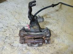 Суппорт на Nissan Cefiro A33 VQ20DE Фото 2