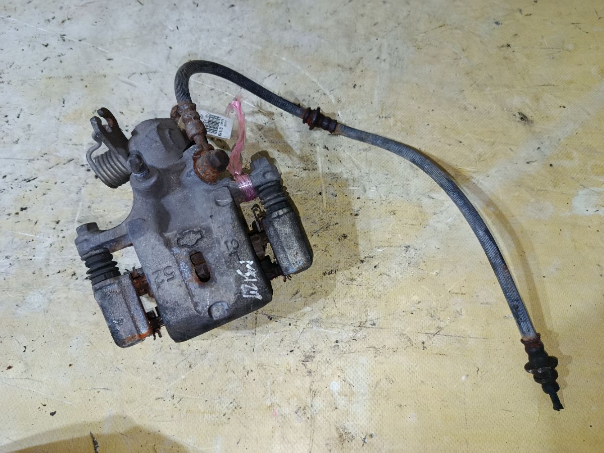 Суппорт на Nissan Cefiro A33 VQ20DE Фото 1