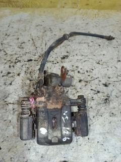 Суппорт на Nissan Cefiro A33 VQ20DE, Заднее Правое расположение