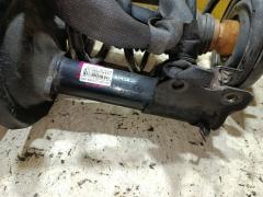 Стойка амортизатора на Nissan Cefiro A33 VQ20DE Фото 2