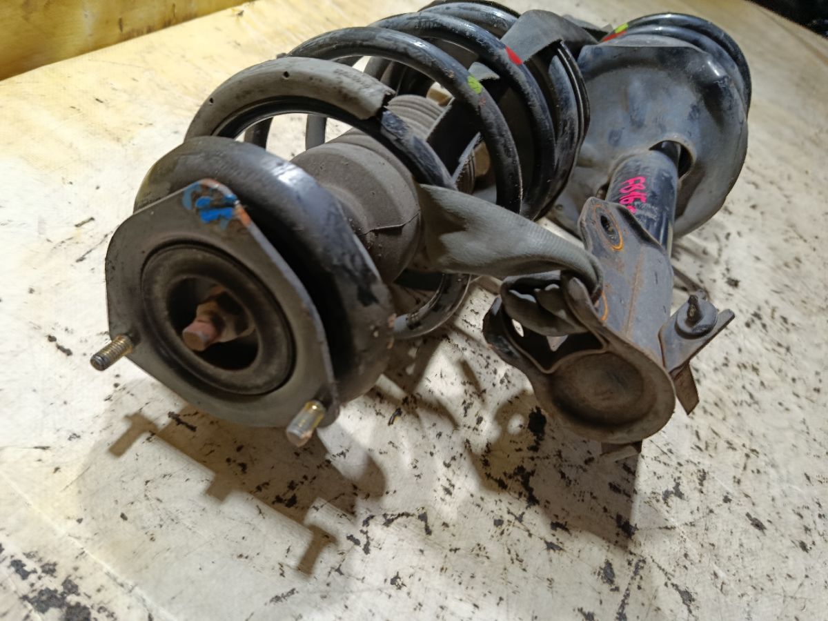 Стойка амортизатора на Nissan Sunny FB15 QG15DE Фото 5