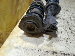 Стойка амортизатора на Nissan Tiida C11 HR15DE Фото 2