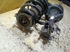 Стойка амортизатора на Nissan Bluebird Sylphy QG10 QG18DE Фото 4