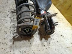 Стойка амортизатора 55300-JM000, 55301-JM000 на Hyundai Tucson 1 JM G4GC Фото 4