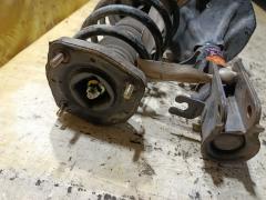 Стойка амортизатора 55300-JM000, 55301-JM000 на Hyundai Tucson 1 JM G4GC Фото 5