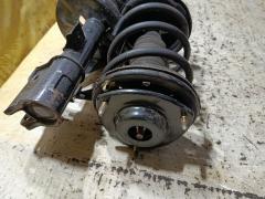 Стойка амортизатора на Mitsubishi Chariot Grandis N84W 4G64 Фото 2