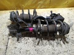 Стойка амортизатора на Nissan Bluebird Sylphy QG10 QG18DE Фото 2