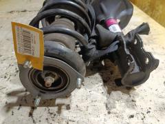 Стойка амортизатора на Nissan Bluebird Sylphy QG10 QG18DE Фото 5