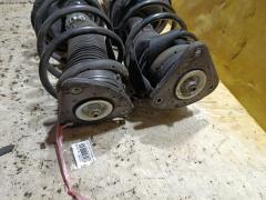 Стойка амортизатора на Ford Focus 2 Фото 4