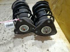 Стойка амортизатора на Ford Focus 2 Фото 2