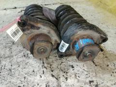 Стойка амортизатора на Nissan Expert VNW11 QG18DE Фото 3