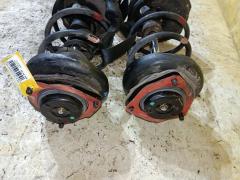 Стойка амортизатора на Nissan X-Trail NT30 QR20DE Фото 4