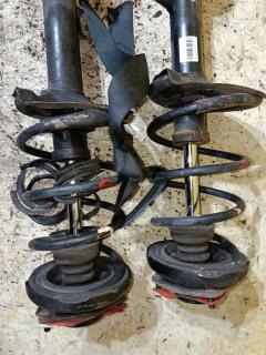 Стойка амортизатора на Nissan X-Trail NT30 QR20DE Фото 5