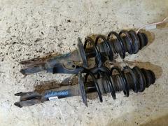 Стойка амортизатора на Toyota Corolla Fielder NZE164G 1NZ-FE, Переднее расположение