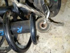 Амортизатор 48531-13250 на Toyota Corolla Fielder NZE164G Фото 3