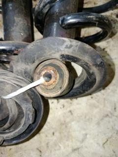 Амортизатор 48531-13250 на Toyota Corolla Fielder NZE164G Фото 4