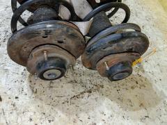 Стойка амортизатора 334405, B3312, CR-049-6473, CR-049F-H61W, CR8964, MR455696, MR519092, MR519093, MR554613, MR554614, MR992092, SJ-049-6473, ST-049-6473 на Mitsubishi Pajero Io H76W 4G93 Фото 5