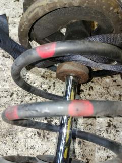 Стойка амортизатора на Nissan X-Trail NT30 QR20DE Фото 3