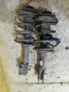 Стойка амортизатора на Nissan X-Trail NT30 QR20DE, Переднее расположение