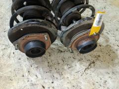 Стойка амортизатора на Nissan Expert VNW11 QG18DE Фото 5