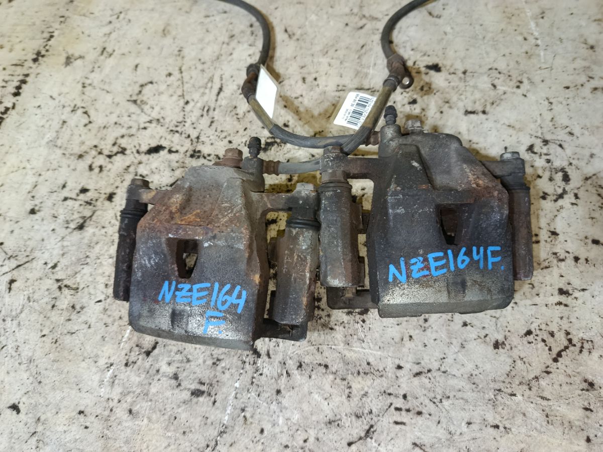 Суппорт на Toyota Corolla Axio NZE164 1NZ-FE Фото 1