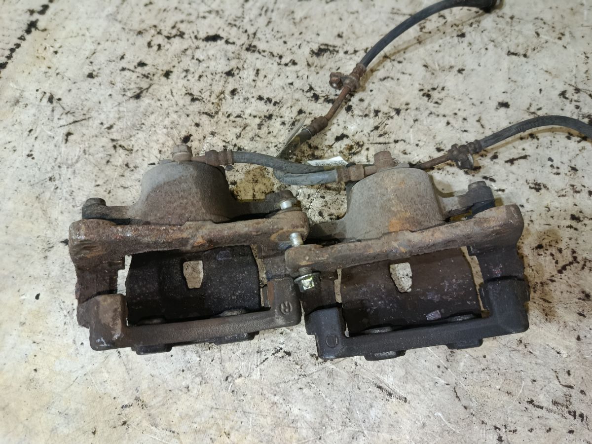 Суппорт на Toyota Corolla Axio NZE164 1NZ-FE Фото 2