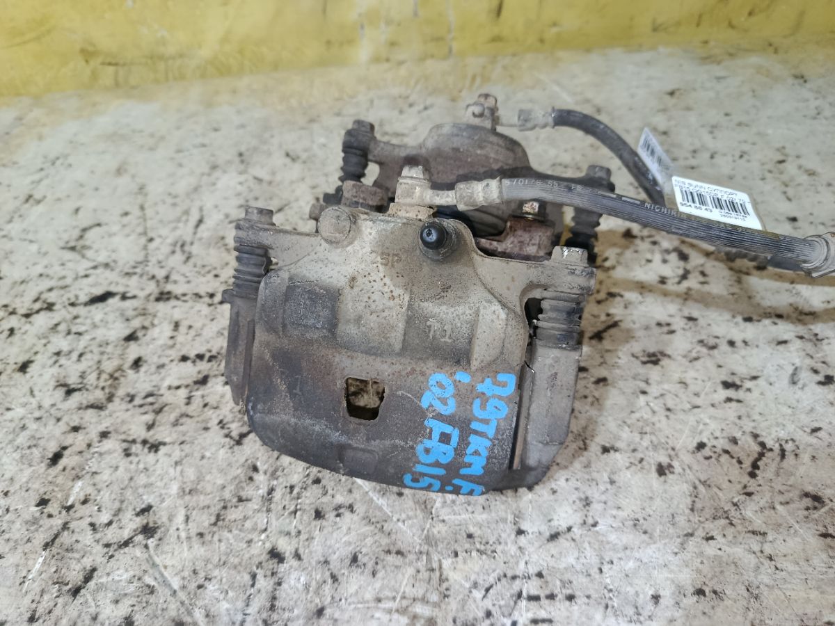 Суппорт на Nissan Sunny FB15 QG15DE Фото 1