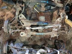 Балка подвески на Toyota Corolla Fielder NZE144G 1NZ-FE 51206-12100, Заднее расположение
