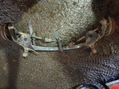 Балка подвески на Toyota Corolla Fielder NZE164G 1NZ-FE, Заднее расположение