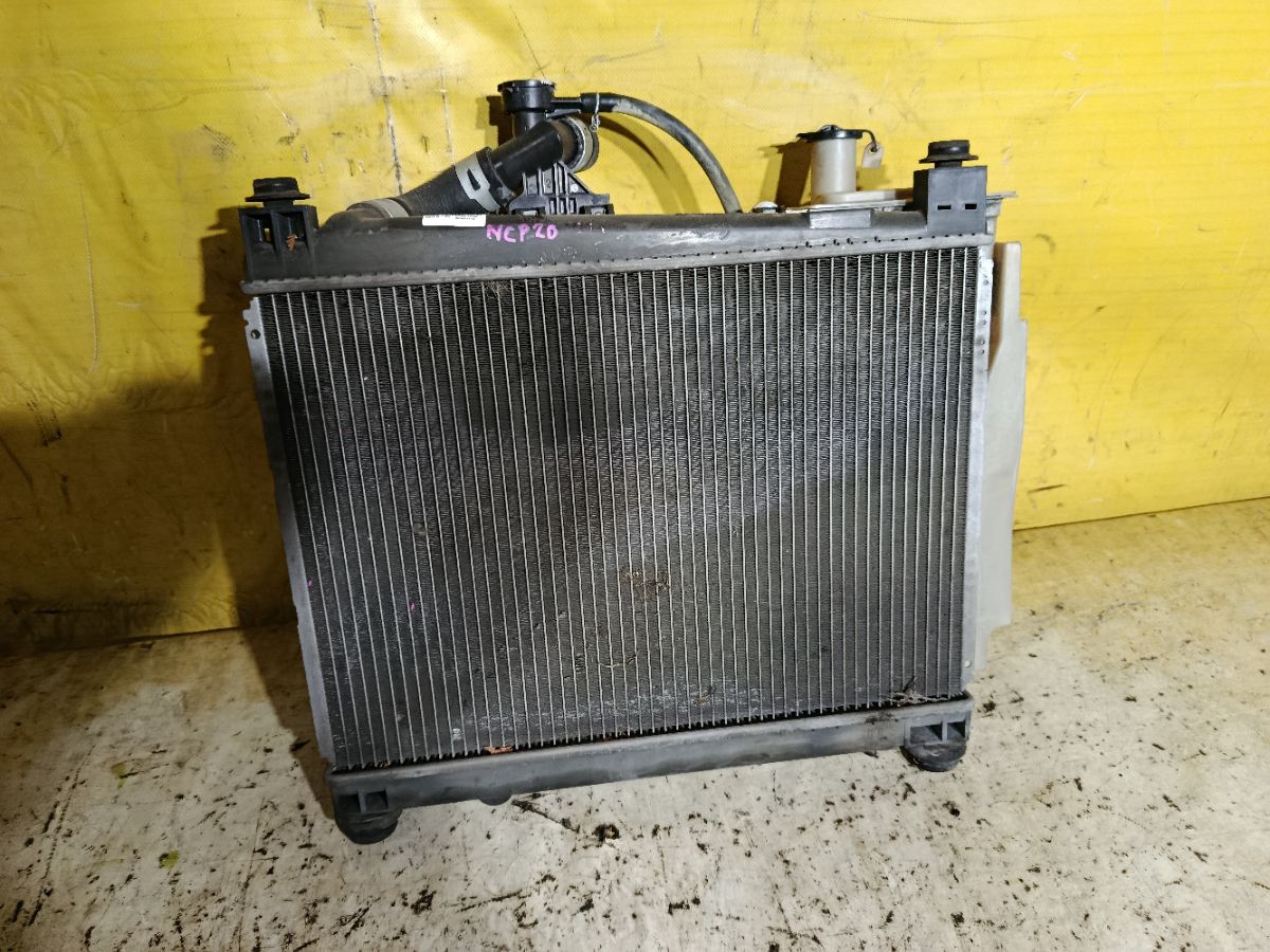 Радиатор ДВС 01153043, 028M89, 1025151SX, 102957, 130225, 1460-0127, 16400-0J020, 16400-21060, 16400-21070, 16400-21070-N1, 16400-21070-R1, 16400-21080, 16400-21081, 16400-21090, 16400-21120, 16400-21121, 1640021060, 1640021070, 164002107087, 1640021071, 1640021080, 16403-0J020, 2060347, 2061046, 2064058, 2064073, 2065108, 210031N, 284798T, 284799H, 284799HA, 284799T, 29170, 29170A, 29340, 31-1125, 34611011, 350213103700, 366000, 53002259, 53212, 60532259, 6112177N, 64799, 64799A, 734841, 810308-4, 8103084K, 8109302258, 8109302287, 812259R, 8660551, 8660553, 8MK 376 748-351, 8MK 376 773-471, ACRB142, ADT39859, CR 1523 000S, CU2305, DA15110CHK, DAP151010CHK, DCM3214, DRM50080, FP 70 A534, FP 70 A534-X, FX-036-8054, FX-036-8054A, JAPRDA153043, JPR0030, KTO259, LH2305(16)A/T, LRC 1907, NC01076053B, NC01076054B, NDT-1121, PL010863, PRS3538, RA2405, RA64799, RA64799A, RA64799Q, RB2927, RD4446, RDA153043, STR0159, STR0160, STTY000W10, T156A59, T553-16, T789-01, TD-036-8054, TD-036-8054A, TO-0195-16, TO2259, TOY0W10, TY-NCP-1216, TY000W10, TY01100501000, TY37062A, TYNCP1216, TYV1005B0, TYYAS99-912, TYYAS99-913, TYYAS99912, VCS4799, WG1722143 на Toyota Funcargo NCP20 2NZ-FE Фото 1