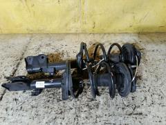 Стойка амортизатора на Mitsubishi Colt Z22A 4A90 333476  4060A198  MR594045  SST0165, Переднее расположение