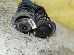 Стойка амортизатора на Toyota Noah AZR65G 1AZ-FSE Фото 5