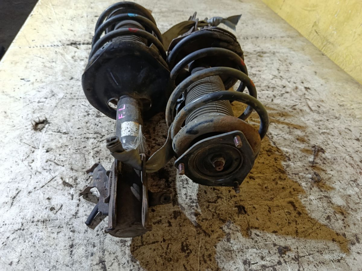 Стойка амортизатора на Nissan Wingroad WFY11 QG15DE Фото 4