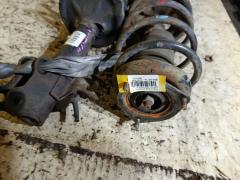 Стойка амортизатора на Nissan Wingroad WFY11 QG15DE Фото 5