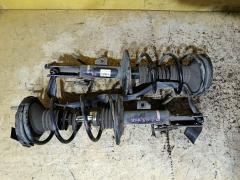 Стойка амортизатора на Toyota Noah AZR60G 1AZ-FSE, Переднее расположение