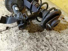 Стойка амортизатора на Toyota Noah AZR60G 1AZ-FSE Фото 3