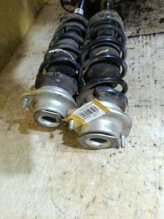 Стойка амортизатора 312847, 332120, 48510-B1040, 48510-B1040A, CR-049-6063, CR-049F-QNC10, CR8803, SJ-049-6063, SST0105, ST-049-6063, ST-049F-KGC10 на Toyota Passo KGC10 1KR-FE Фото 4