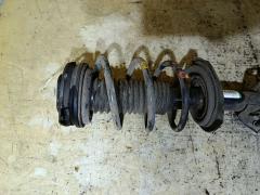 Стойка амортизатора 54303-CY00B на Nissan Serena C25 MR20DE Фото 3
