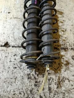 Амортизатор на Daihatsu Move LA150S Фото 2