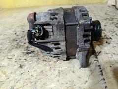 Генератор 23100-1HZ1A на Nissan Note E12 HR12DE Фото 4